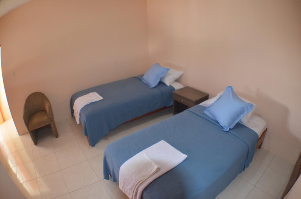 Hostal Tongo Reef Puerto Baquerizo Moreno Habitación foto